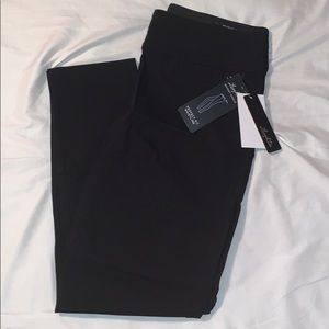 Full length, skinny ankle dress pants.